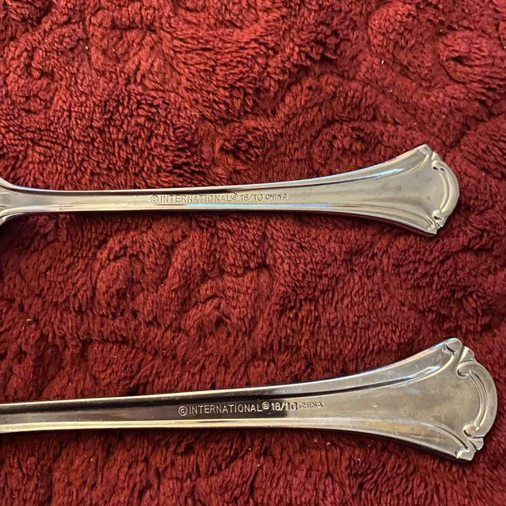 Elegant Silver Fork and Spoon Set. International 18/10. Excellent condition.